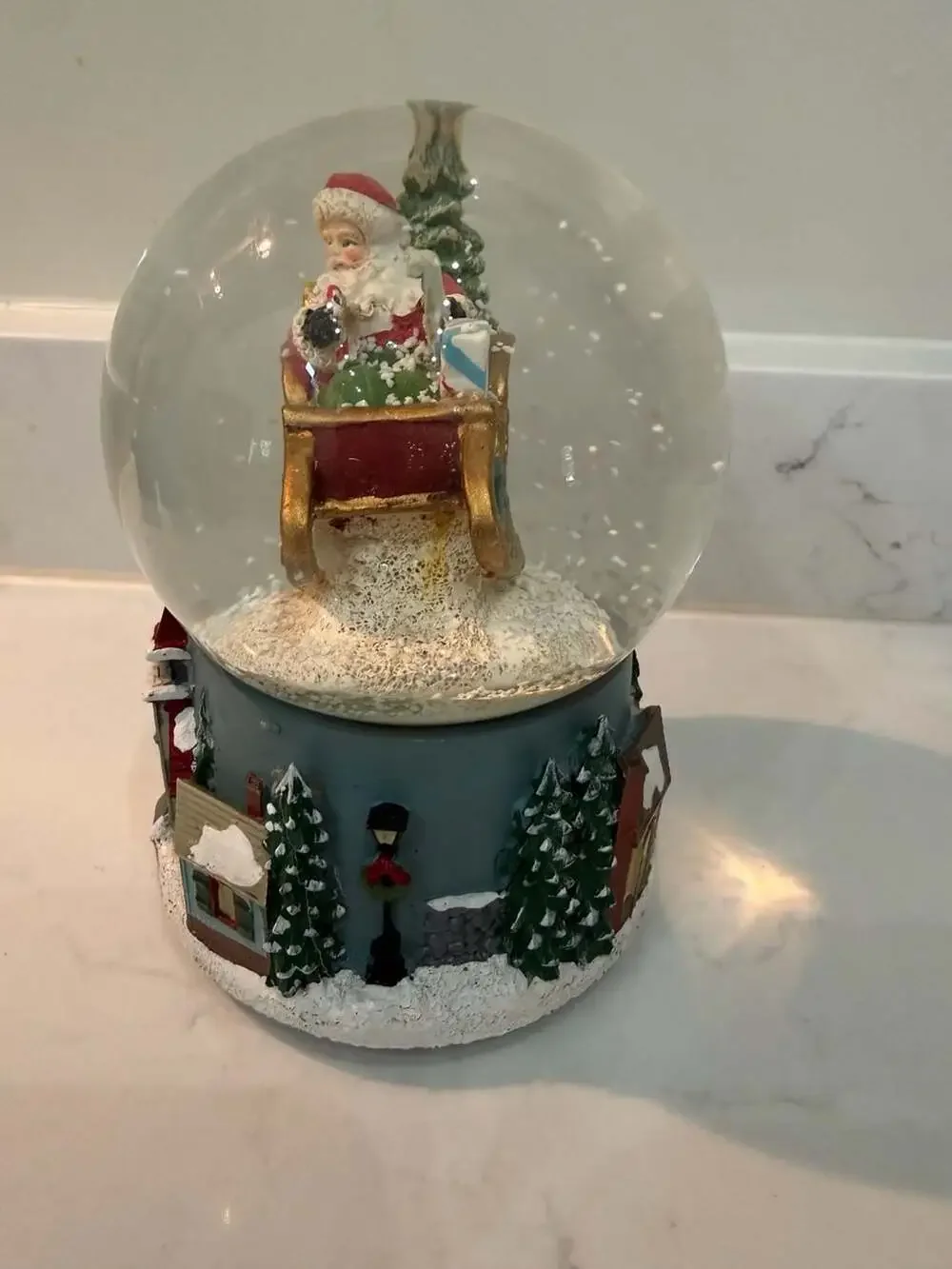 Roman Santa in Sleigh Musical Glitter Snow Globe with Winter Village Base
